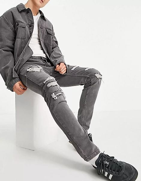 Topman – Eng geschnittene Jeans mit Stretchanteil sowie Zierrissen und Flic günstig online kaufen