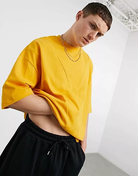 ASOS DESIGN – Oversize-Pikee-T-Shirt in Senfgelb mit Patchworkdesign-Orange günstig online kaufen