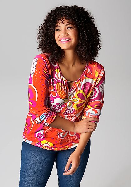 Aniston PLUS Langarmshirt, mit farbharmonischen, fantasievollem Druck günstig online kaufen