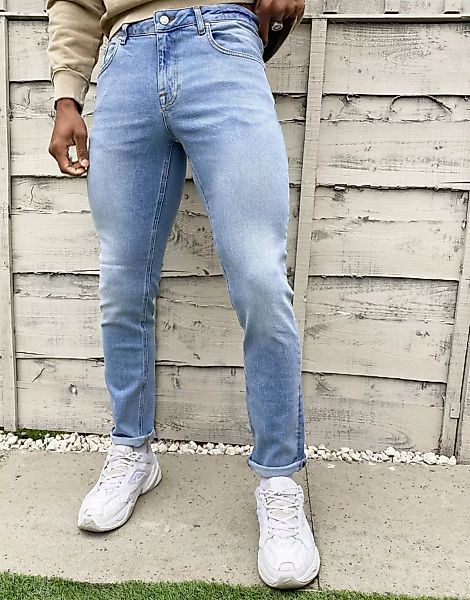 ASOS DESIGN – Schmale Stretch-Jeans in verwaschenem Hellblau günstig online kaufen
