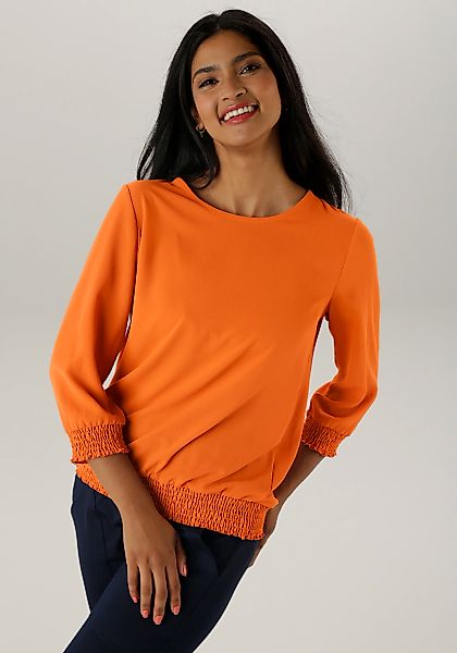 Aniston SELECTED Schlupfbluse, mit Smokbündchen und allover Blumenmuster günstig online kaufen
