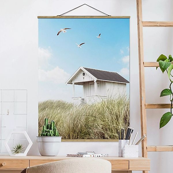 Stoffbild mit Posterleisten Holzhütte am Strand günstig online kaufen