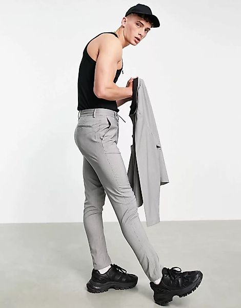 ASOS DESIGN – Elegante, schmal geschnittene Jogginghose in Grau mit kleinem günstig online kaufen