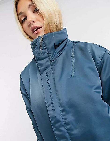 Nike – Premium-Jacke in Blaugrün mit Kragenlogo günstig online kaufen