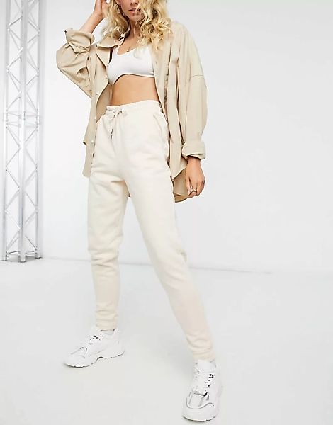Miss Selfridge – Jogginghose mit elastischen Bündchen in Creme-Weiß günstig online kaufen