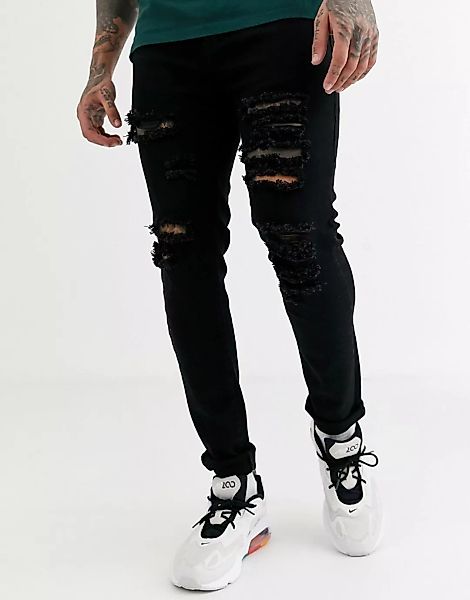 Liquor N Poker – Enge Jeans mit Rissen in Schwarz günstig online kaufen