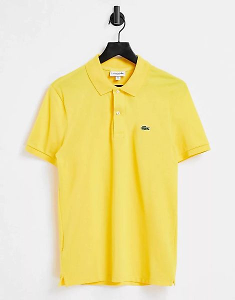 Lacoste – Schmal geschnittenes Polohemd mit Logo in Gelb günstig online kaufen