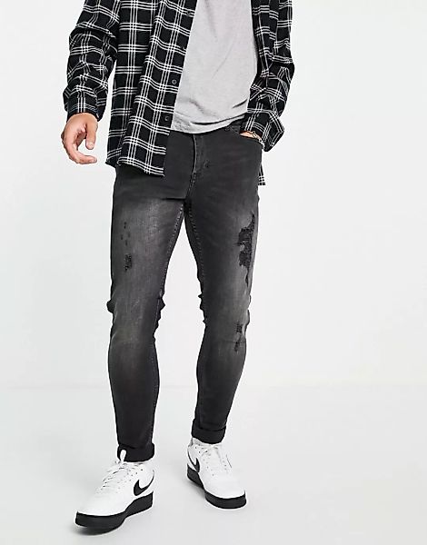 New Look – Enge Jeans mit Rissen in verwaschenem Schwarz günstig online kaufen
