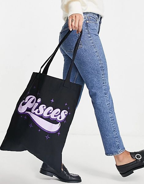 ASOS DESIGN – Shopper aus Baumwolle in Schwarz mit „Pisces“-Textprint günstig online kaufen