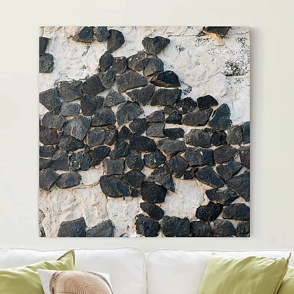 Leinwandbild Mauer mit Schwarzen Steinen günstig online kaufen