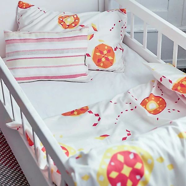 Kinderbettwäsche Starflower Orange Für Wiege Und Kleinkinderbett günstig online kaufen