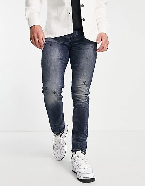 River Island – Schmal geschnittene Jeans in Blauschwarz günstig online kaufen