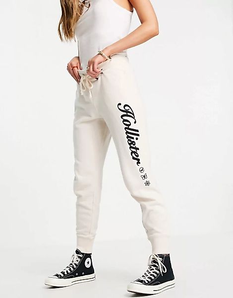 Hollister – Jogginghose mit Logo in Creme-Weiß günstig online kaufen