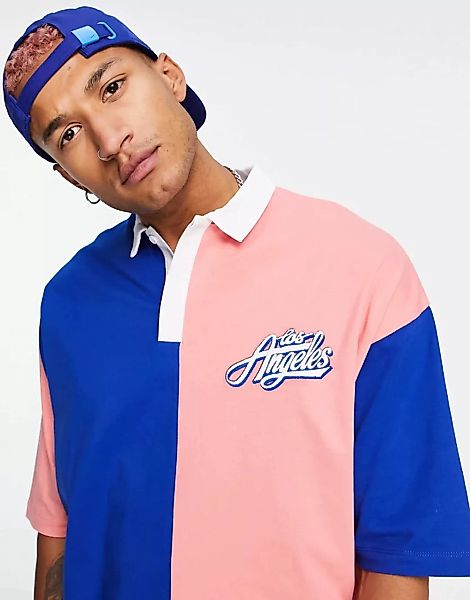 ASOS DESIGN – Übergroßes Polohemd mit Farbblockdesign in Blau und Rosa und günstig online kaufen