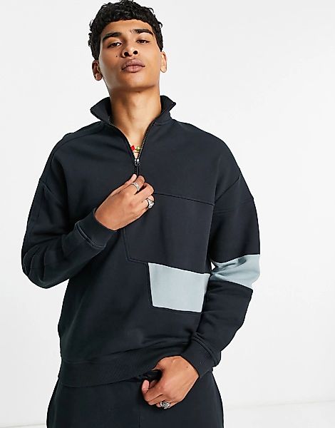 ASOS DESIGN – Oversized-Sweatshirt mit kurzem Reißverschluss und farblich a günstig online kaufen