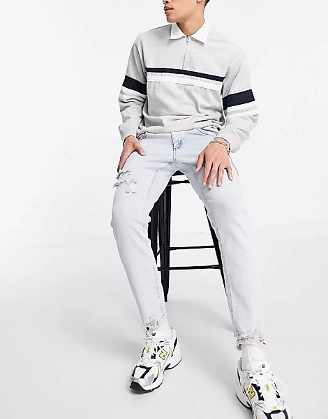 ASOS DESIGN – Schmale Stretch-Jeans mit Zierrissen und ausgebleichter Wasch günstig online kaufen