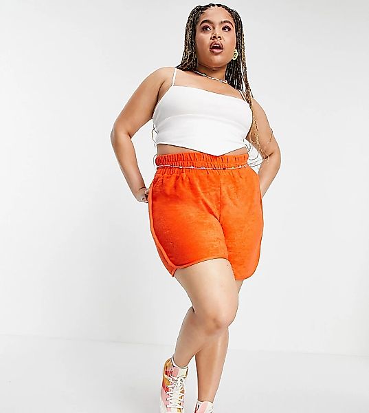 ASOS DESIGN Curve – Shorts aus Frottee mit abgerundetem Saum in Ruby Orange günstig online kaufen