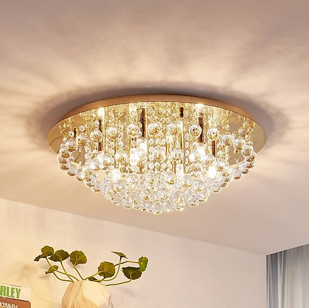 Lindby Deckenleuchte Gillion, 8-flg., gold, Kristall, Ø 55cm günstig online kaufen