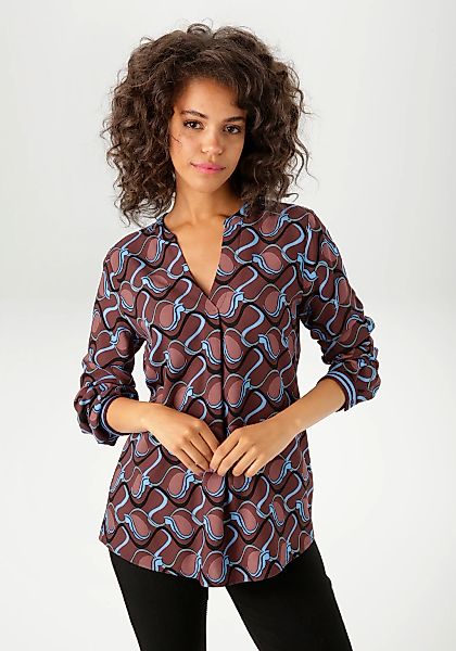 Aniston CASUAL Schlupfbluse, mit trendfarbigen, grafischem Retro-Muster - N günstig online kaufen