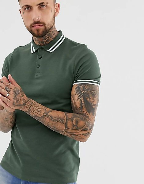 ASOS DESIGN – Piqué-Polohemd in Khaki mit Zierstreifen-Grün günstig online kaufen