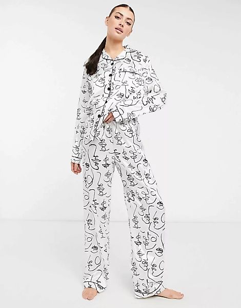 Night – Langes Pyjama-Set aus Satin mit abstraktem Gesichtsprint-Weiß günstig online kaufen