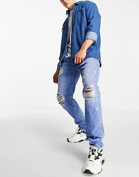 Tommy Jeans – Ethan – Lockere, gerade geschnittene Jeans mit starker Used-O günstig online kaufen