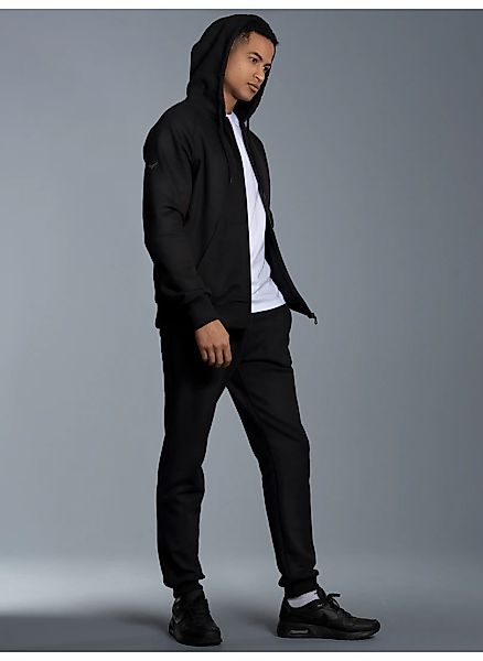 Trigema Freizeitanzug "TRIGEMA Jogginganzug mit Kapuze und Reißverschluss" günstig online kaufen