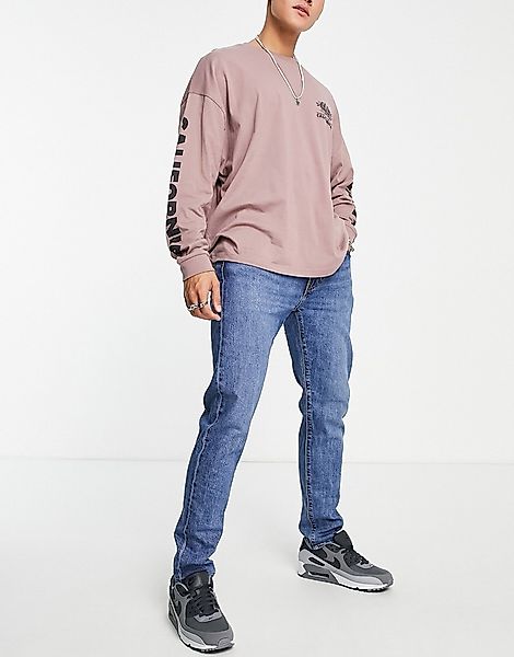 Levi's – 512 – Schmal zulaufende Jeans mit schmalem Schnitt in mittelblauer günstig online kaufen