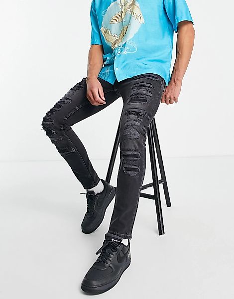Topman – Eng geschnittene Stretch-Jeans in verwaschenem Schwarz mit extreme günstig online kaufen