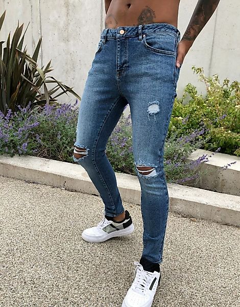 ASOS DESIGN – Verschlissene Spray-on-Jeans im Vintage-Look mit Powerstretch günstig online kaufen