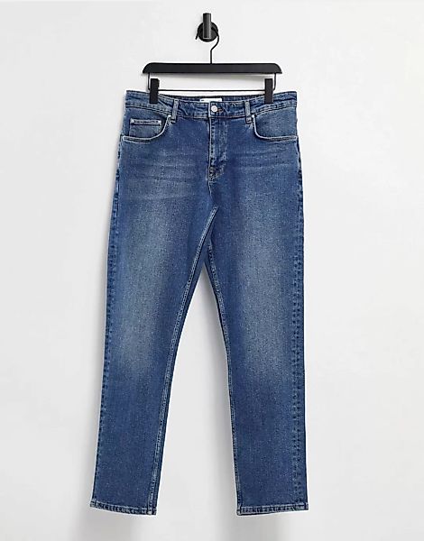 ASOS DESIGN – Schmal geschnittene Stretch-Jeans in Vintage-Mittelblau günstig online kaufen
