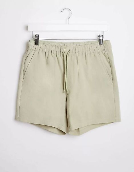 ASOS DESIGN – Schmal geschnittene Shorts in Grün günstig online kaufen