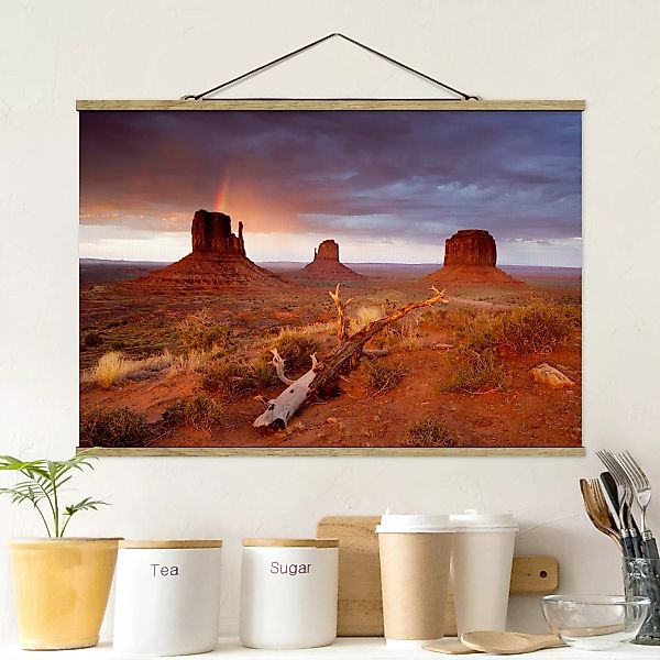 Stoffbild Berge mit Posterleisten - Querformat Monument Valley bei Sonnenun günstig online kaufen