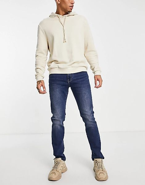 Armani Exchange – J13 – Schmale Jeans in mittlerer Waschung-Blau günstig online kaufen
