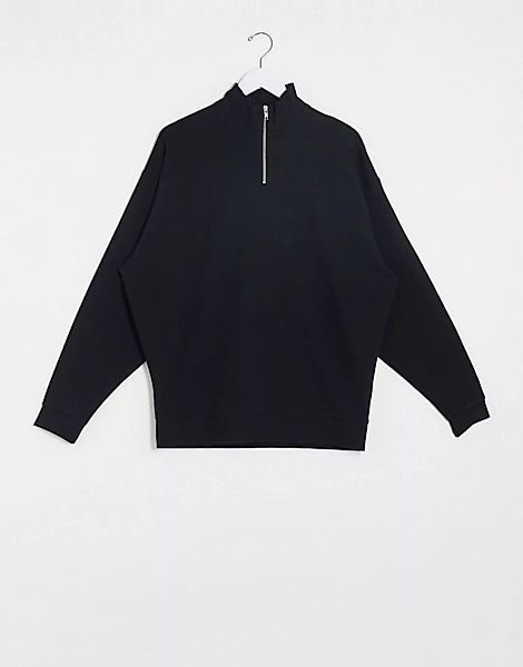 ASOS DESIGN – Übergroßes Sweatshirt mit kurzem Reißverschluss in Schwarz günstig online kaufen