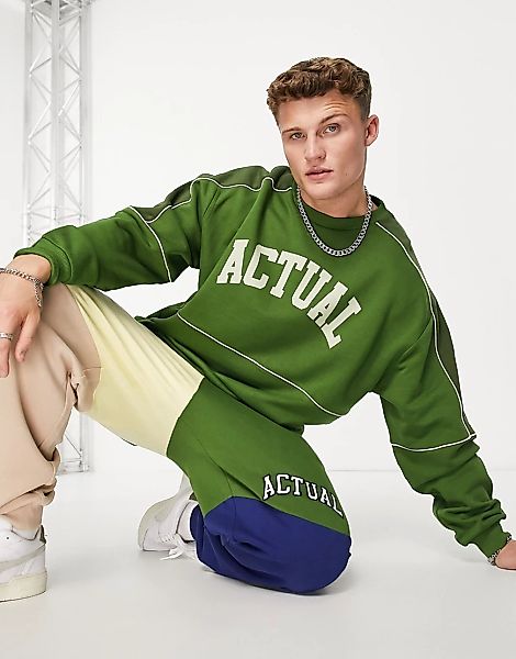 ASOS Actual – Oversize-Sweatshirt in Grün mit Cord-Einsätzen und Logoprint günstig online kaufen