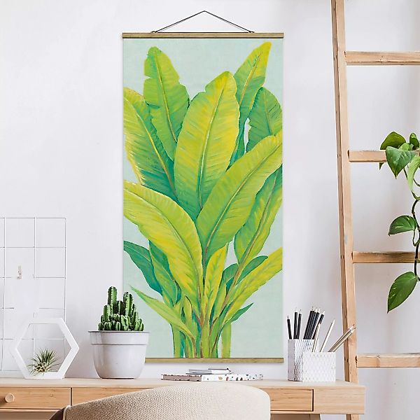 Stoffbild Blumen mit Posterleisten - Hochformat Gelbgrüne Bananenblätter günstig online kaufen