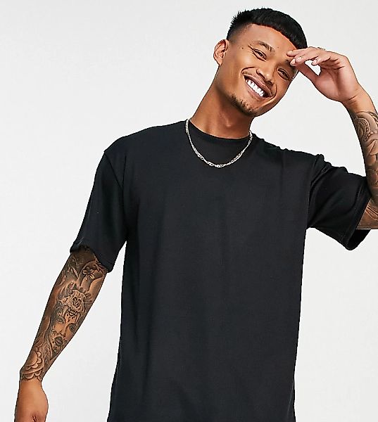 VAI21 – Geripptes T-Shirt in Schwarz günstig online kaufen