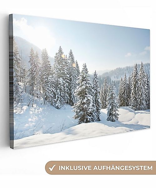 OneMillionCanvasses® Leinwandbild Die Sonne scheint auf die verschneiten Bä günstig online kaufen