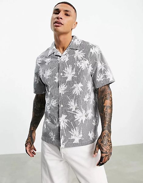 Calvin Klein Jeans – Kurzärmliges Hemd mit Palmenprint in Schwarz günstig online kaufen
