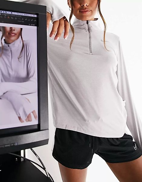 Nike Running – Element – Sweatshirt in Flieder mit kurzem Reißverschluss-Vi günstig online kaufen