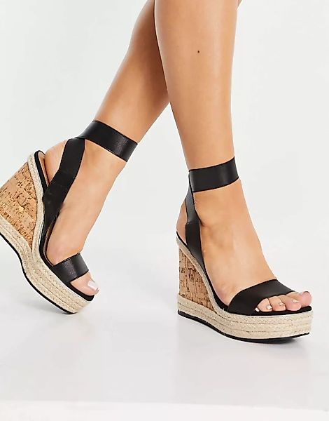 ASOS DESIGN – Tiffany – Elastische Sandalen mit Keilabsatz aus Kork in Schw günstig online kaufen
