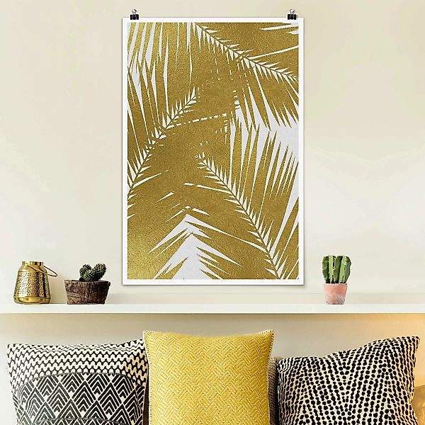 Poster Blick durch goldene Palmenblätter günstig online kaufen