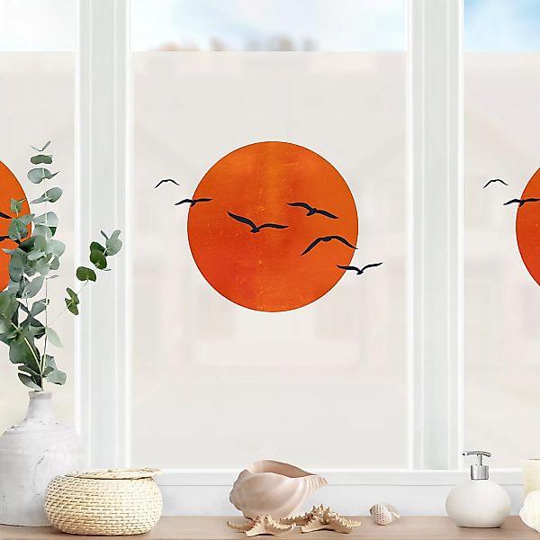 Fensterfolie Vogelschwarm vor roter Sonne I günstig online kaufen