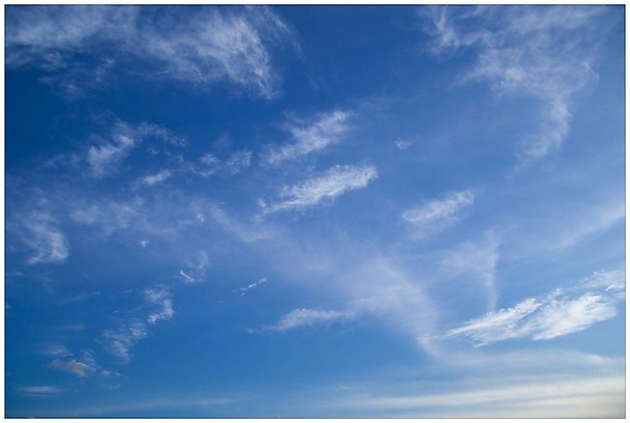 Wallario Poster, Blauer Himmel mit vereinzelten günstig online kaufen