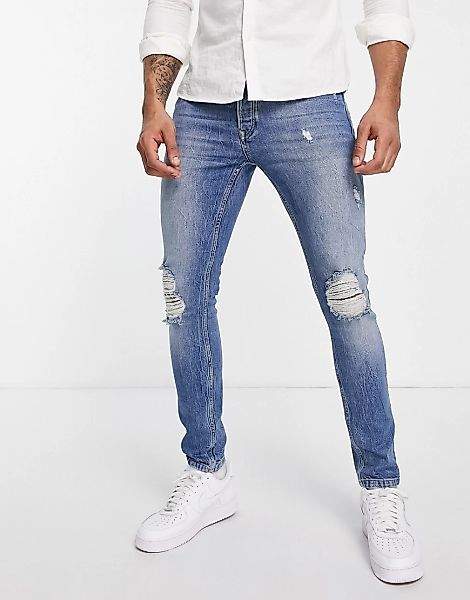 Topman – Eng geschnittene Stretch-Jeans in heller Waschung mit großem Loch günstig online kaufen