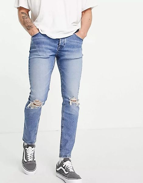 ASOS DESIGN – Enge Jeans aus Bio-Baumwollmix in verwaschenem Hellblau mit R günstig online kaufen