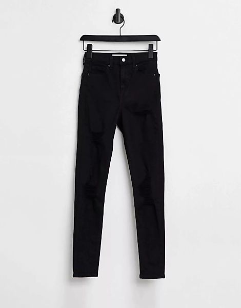 Topshop – Jamie – Eng geschnittene Jeans mit extremen Rissen in Schwarz günstig online kaufen