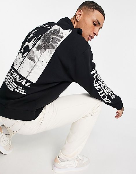 ASOS DESIGN – Oversized Sweatshirt in Schwarz mit Fotoprints günstig online kaufen