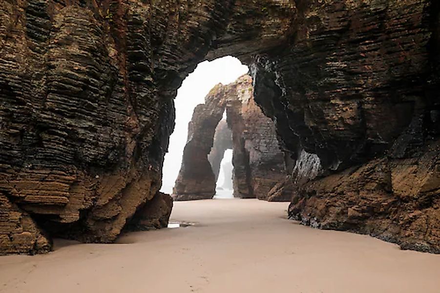 Papermoon Fototapete »GROTTE-FELSEN EBBE SPANIEN TUNNEL STRAND DUNEN MEER« günstig online kaufen